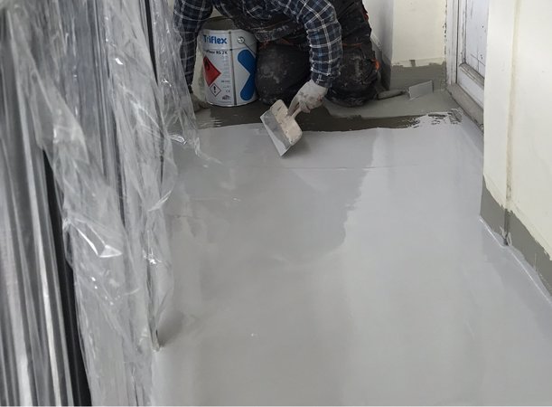 Aplikacja-warstwy-nośnej-systemu-hydroizolacyjnego7bf06.JPG